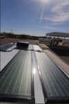 GlobalSolar-PowerFlexMobile-4onrv.jpg (21994 bytes)